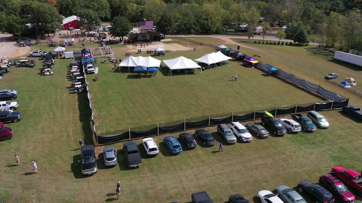 Aerial view of the Bluff Valley grounds, tents and campers